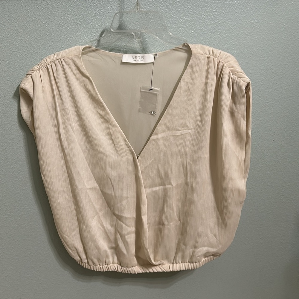 ASTR cream wrap top with shoulder pads